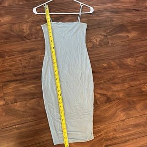 Naked wardrobe blue dress